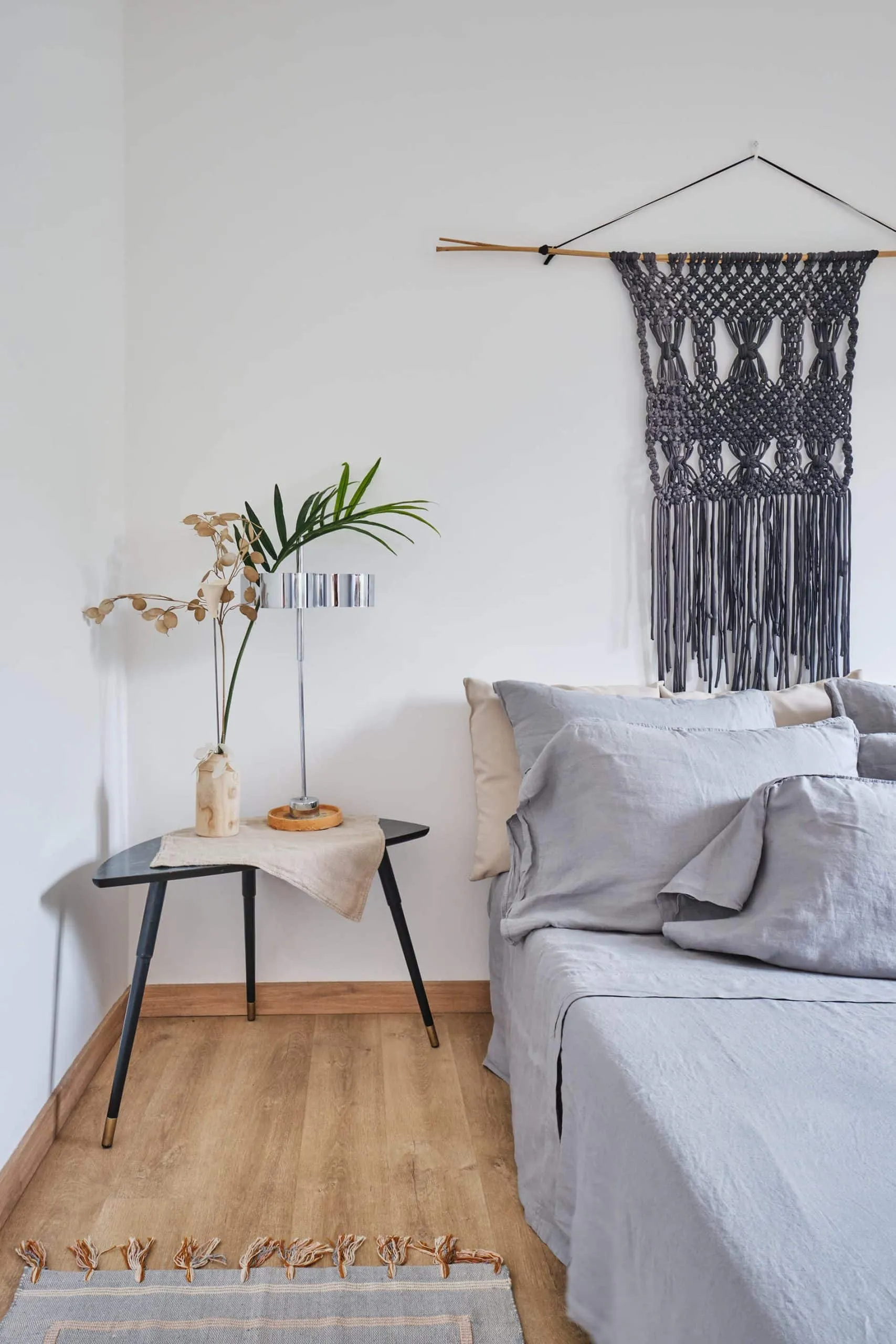 Barcelona apartment - first floor, bedroom with grey bed sheets, designed by Beatrice Leupold
