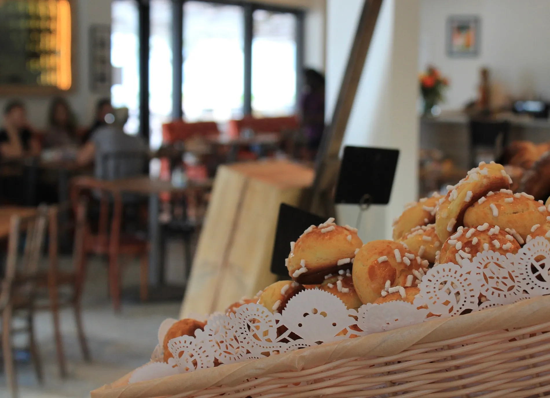 Café Crème Miami Restaurant - picture of sweets in a basket, design by Beatrice Leupold