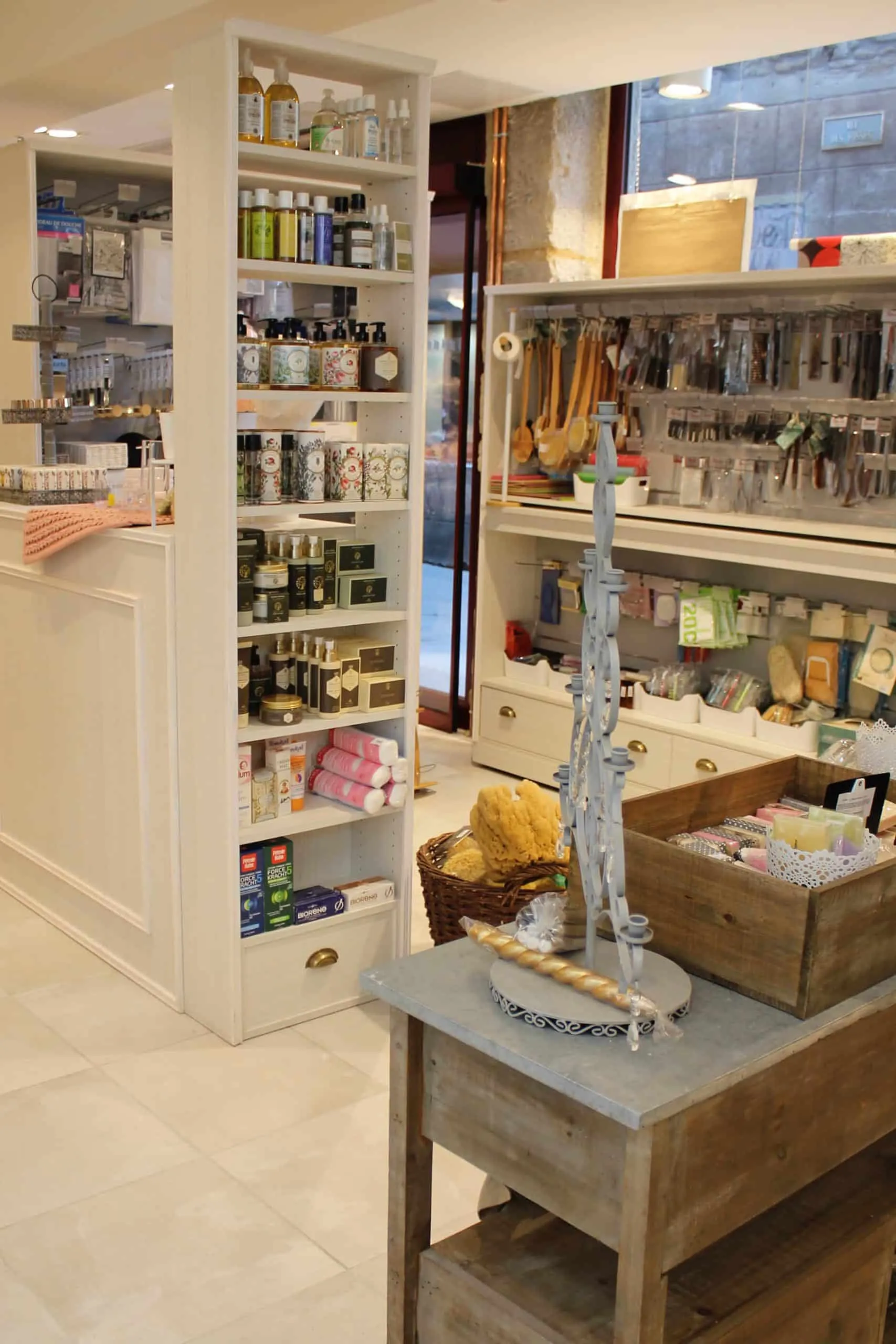 Droguerie de la Tour - custom stands fitted to the medieval tower interior